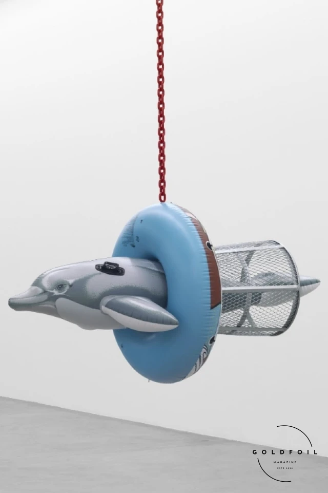 Jeff Koons inflatable art is now on display in London, this is a dolphin in a rubbish bin Jeff Koons inflatable art is now on display in London, this is a dolphin in a rubbish bin