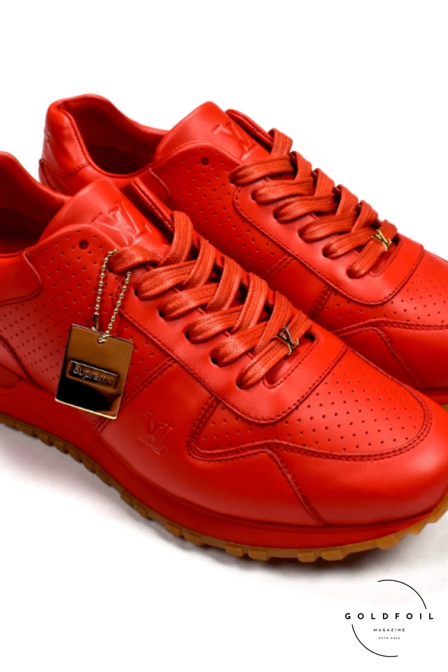 Louis Vuitton x Supreme 2016 Run Away red sneaker with gold LV detailing Louis Vuitton x Supreme 2016 Run Away red sneaker with gold LV detailing