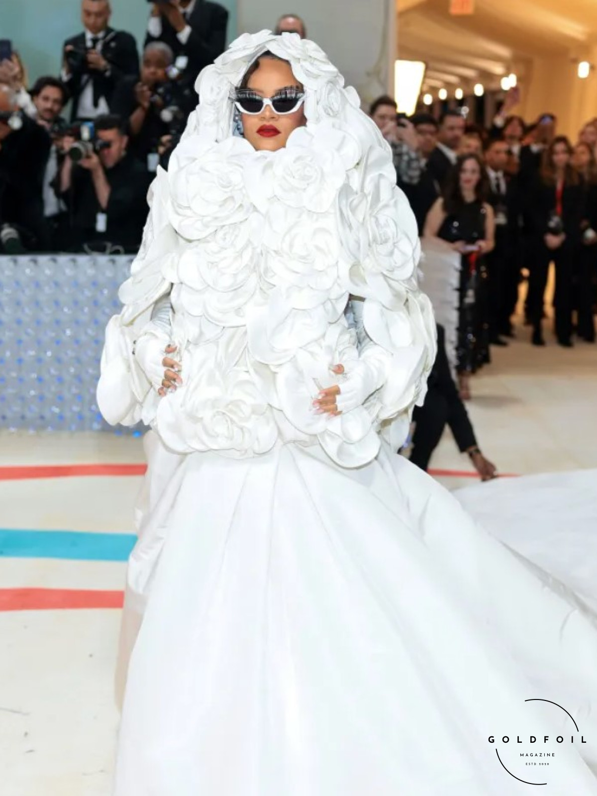 Rihanna Wearing a custom Valentino white gown at the MEt gala 2023