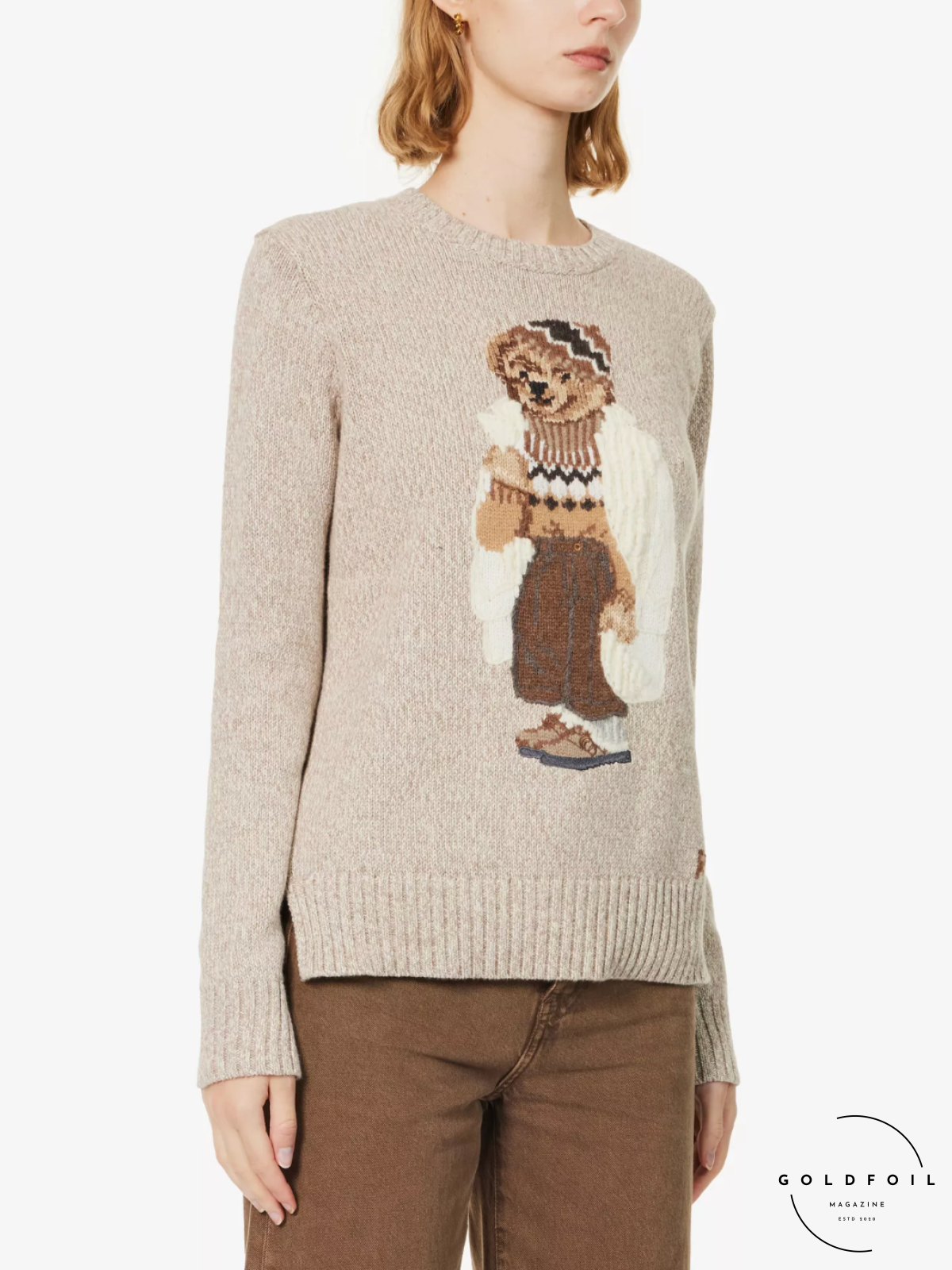 A Polo Ralph Lauren Beige Knit Jumper featuring a teddy bear is the perfect Christmas Jumper this festive season 2023